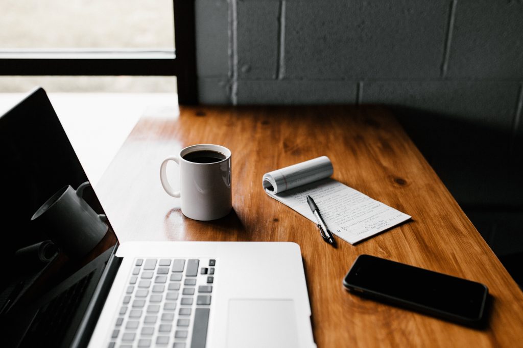 Photo of desk with laptop
